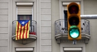 Estelada y semáforo verde.