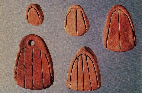 Incised parabollae tokens from Susa dating to approximately 5500 B.P.